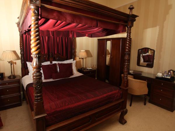 Kildonan Lodge Hotel : photo 1 de la chambre chambre supérieure avec lit à baldaquin