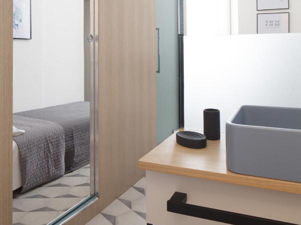 Genova Suite Art : photo 2 de la chambre petite chambre simple