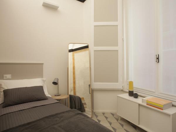 Genova Suite Art : photo 3 de la chambre petite chambre simple