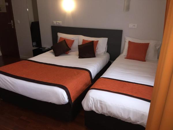 Hôtel Vendôme : photo 1 de la chambre chambre lits jumeaux climatisée