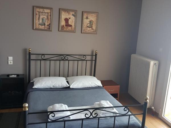 Exarchos Guest House : photo 1 de la chambre chambre quadruple