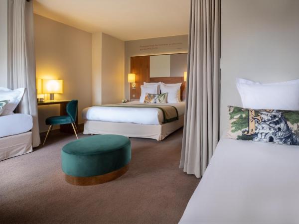 Hôtel Le Tourville by Inwood Hotels : photo 4 de la chambre suite familiale