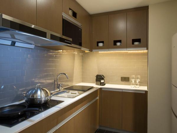 Hyatt House Shanghai New Hongqiao : photo 1 de la chambre suite lit king-size avec cuisine