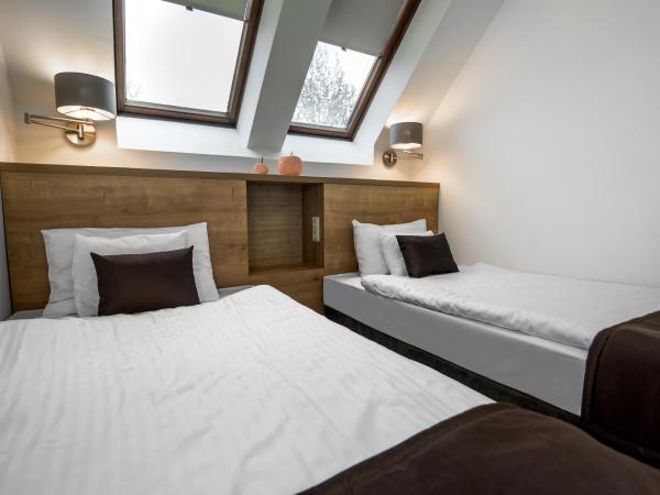 Rubin Wellness & Conference Hotel : photo 3 de la chambre chambre familiale - vue sur jardin