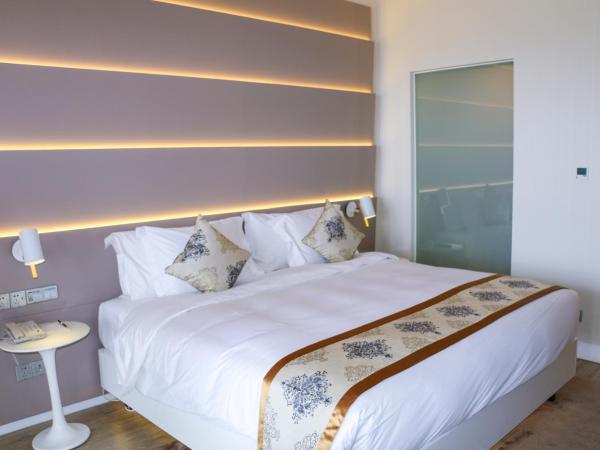 Sanya Phoenix Airport Hotel : photo 5 de la chambre chambre lit queen-size deluxe
