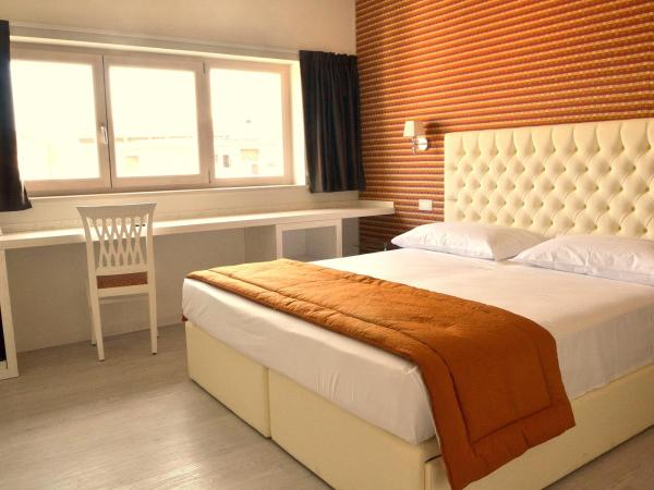 Nuova Opera Rooms : photo 2 de la chambre chambre triple - vue sur ville