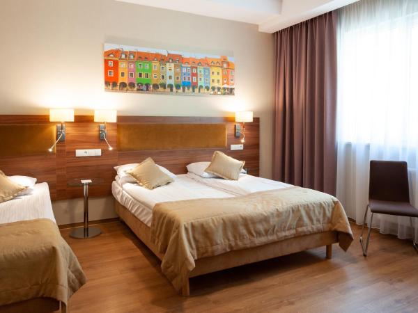 Hotel Topaz Poznań Centrum : photo 2 de la chambre chambre triple deluxe