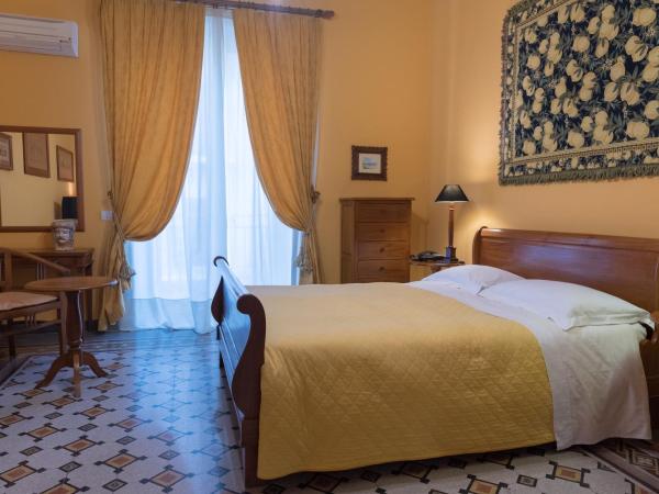 palazzo pantaleo : photo 2 de la chambre chambre familiale avec balcon