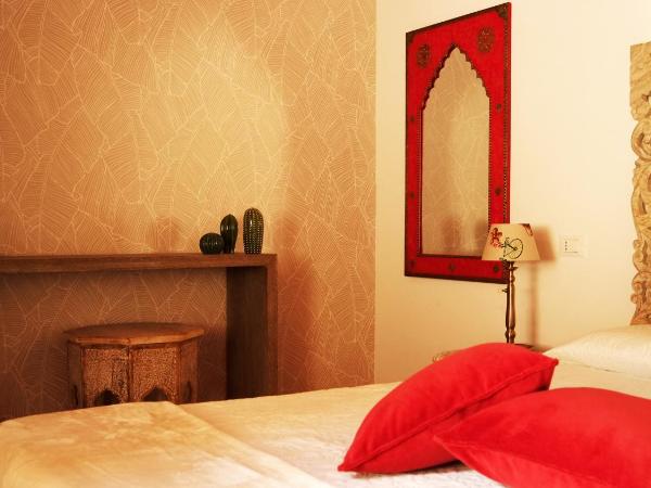 IndispArte Suites : photo 3 de la chambre chambre familiale supérieure