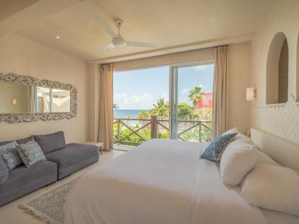 Casa Coco by Coco B Isla : photo 3 de la chambre suite lit king-size - vue partielle sur océan