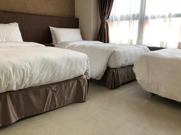 WE Hotel : photo 1 de la chambre chambre lits jumeaux avec lit d’appoint - 301