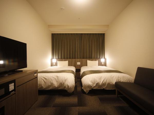 Dormy Inn Korakuen : photo 1 de la chambre chambre lits jumeaux standard