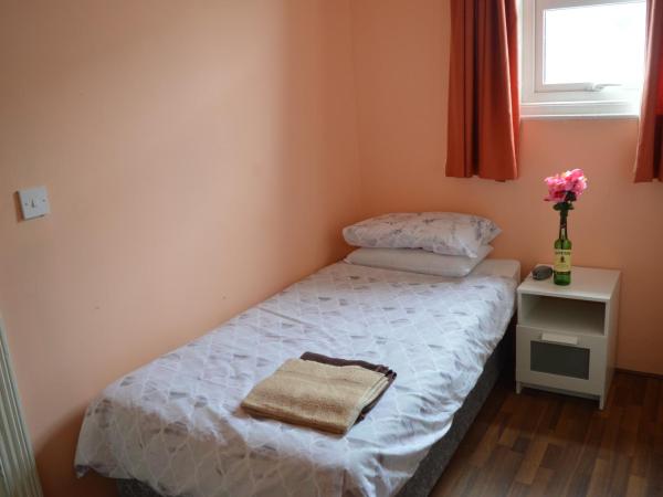 Library View Villa Holiday Home : photo 3 de la chambre chambre simple standard avec salle de bains commune