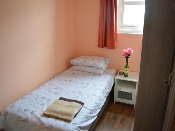 Library View Villa Holiday Home : photo 8 de la chambre chambre simple standard avec salle de bains commune