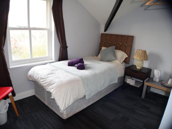 Queens Guesthouse Manchester : photo 4 de la chambre petite chambre simple