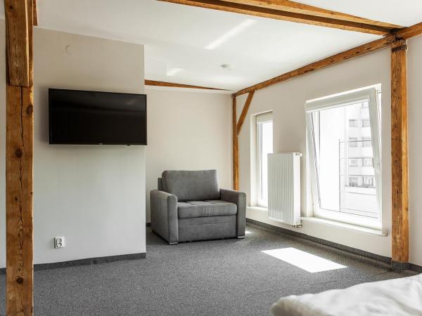 Gdynia Centrum : photo 2 de la chambre chambre double deluxe (2 adultes + 1 enfant)