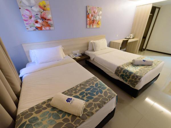 Samudra Hotel Kuching : photo 2 de la chambre chambre lits jumeaux