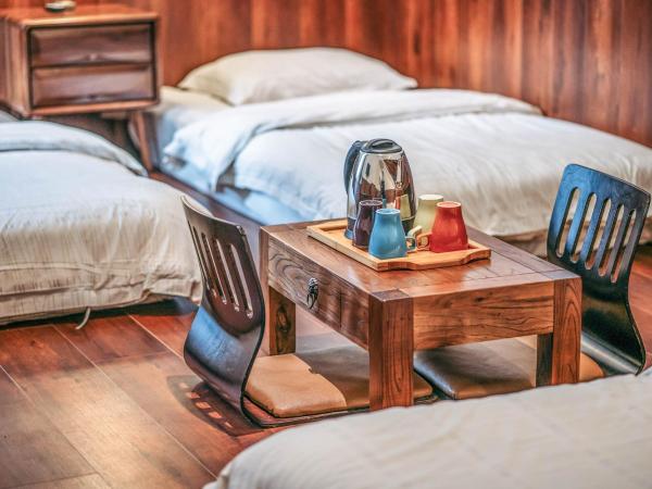 Chengdu Flipflop Hostel Poshpacker (Chunxi Road Metro Station) : photo 2 de la chambre chambre quadruple standard - salle de bains privative