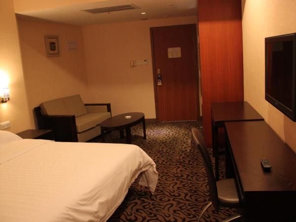 Xin Hua Hotel Guangzhou : photo 4 de la chambre chambre double deluxe - vue sur rivière