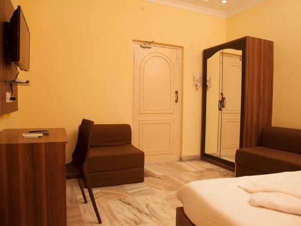 Om Sai Villa Guesthouse : photo 3 de la chambre chambre familiale deluxe