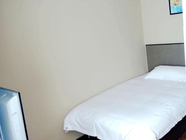 Hangzhou Yuqi Hotel : photo 1 de la chambre chambre simple avec douche