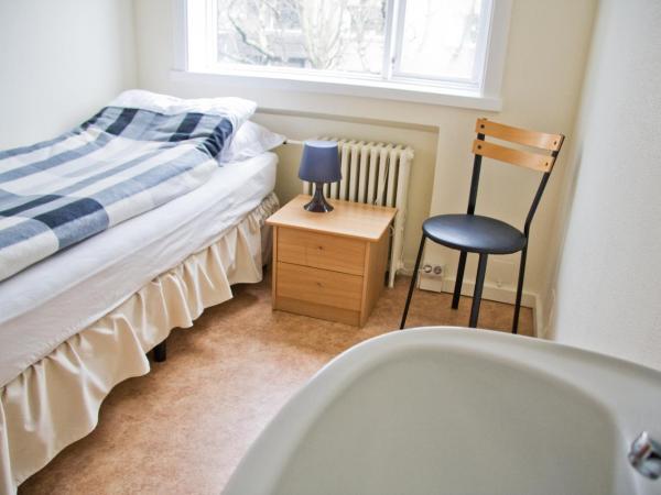 Igdlo Guesthouse : photo 2 de la chambre chambre simple avec salle de bains commune