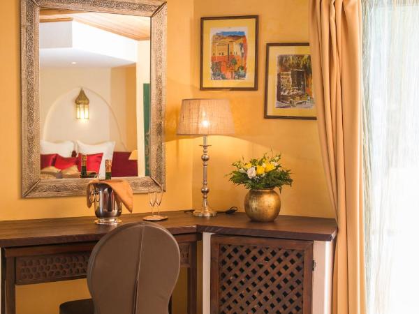 La Villa Majorelle : photo 2 de la chambre suite lit king-size - vue sur piscine