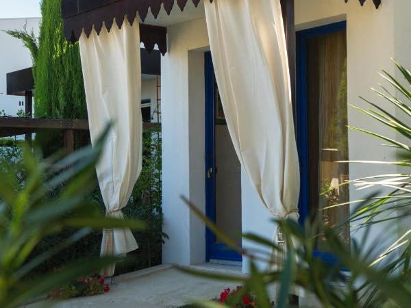 La Villa Majorelle : photo 4 de la chambre suite lit king-size - vue sur piscine