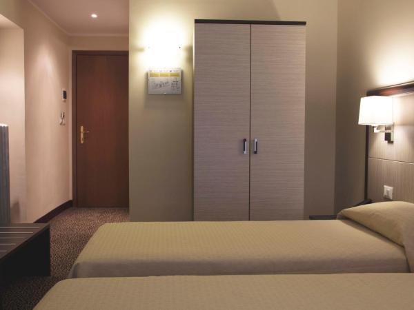 Hotel Alpi Resort : photo 4 de la chambre chambre lits jumeaux