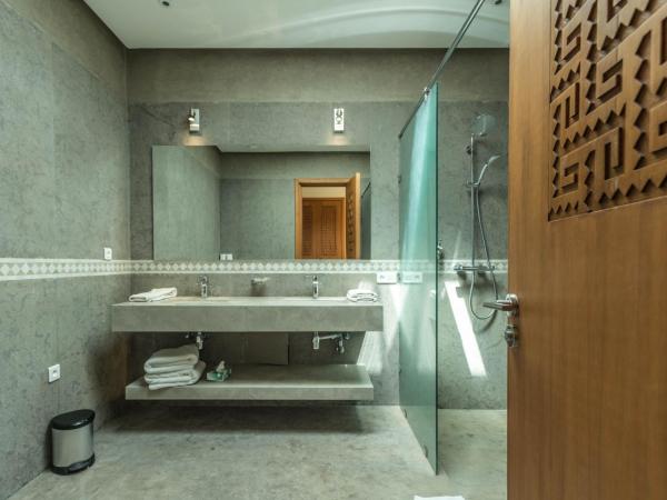 Villa Le Perroquet Bleu : photo 3 de la chambre suite lit queen-size deluxe