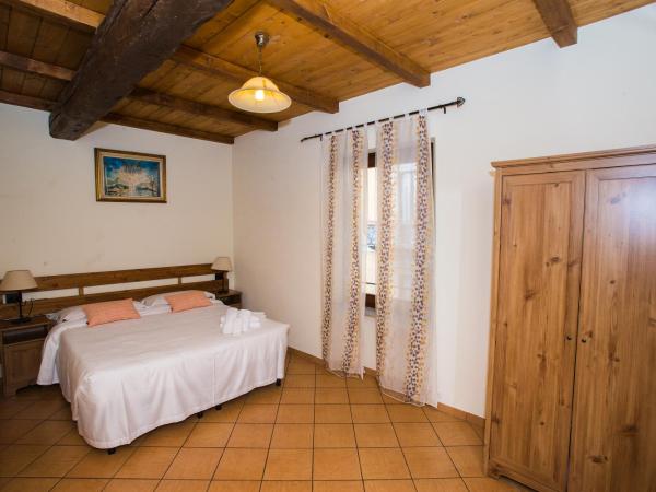 La Fornasetta : photo 3 de la chambre chambre double ou lits jumeaux avec salle de bains