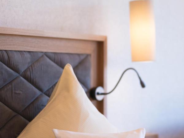 Garten - Hotel Sallerhof : photo 4 de la chambre deluxe triple-bedroom