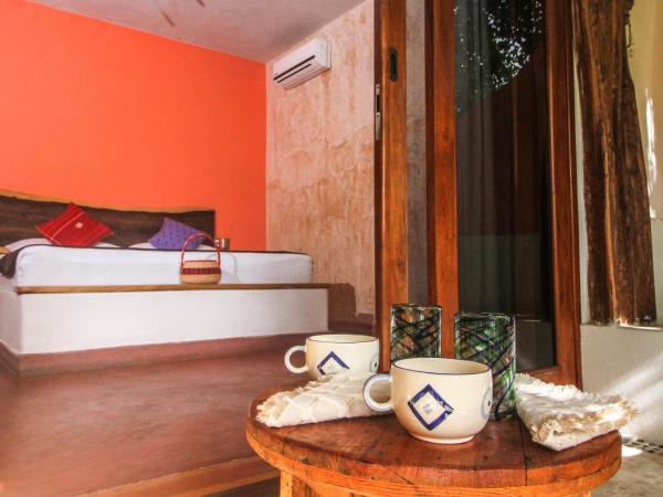 Corazon De Jade Tulum : photo 6 de la chambre room with king bed with balcony garden view and private bathroom