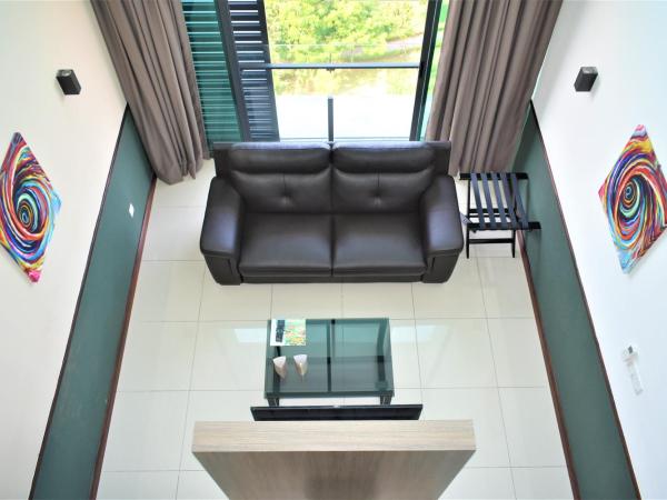 D'Wharf Hotel & Serviced Residence : photo 3 de la chambre suite en duplex