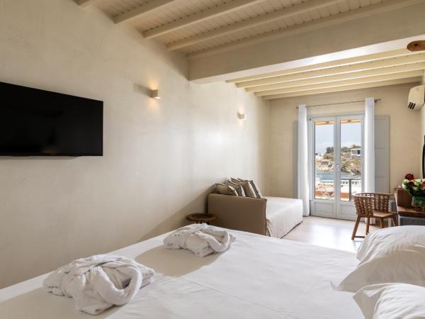 Poseidon Hotel Suites : photo 4 de la chambre chambre lit double ou lits jumeaux supérieure - front de mer