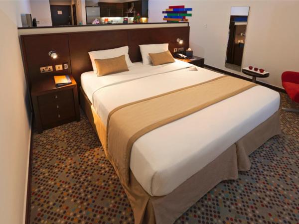 MENA ApartHotel Albarsha At The Mall : photo 7 de la chambre studio - non-fumeurs - lit king-size - 20 % de réduction sur nourriture et boissons et service de blanchisserie