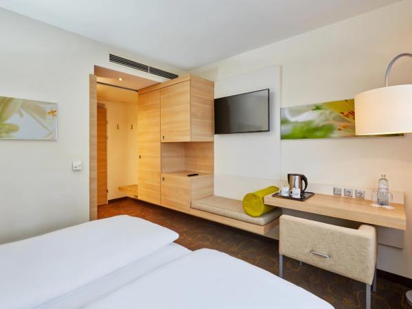H+ Hotel Salzburg : photo 2 de la chambre chambre double ou lits jumeaux confort 