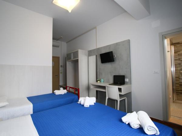 Hotel Kim : photo 3 de la chambre chambre triple