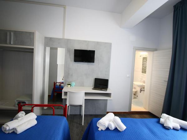 Hotel Kim : photo 4 de la chambre chambre triple