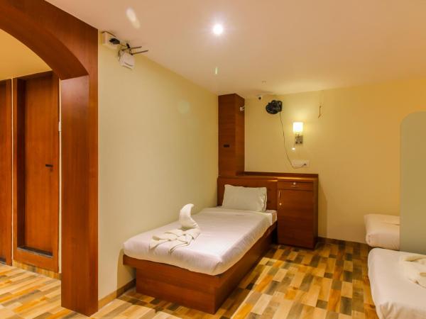 Blossom Dormitory For Male and Female : photo 3 de la chambre lit simple dans dortoir pour hommes