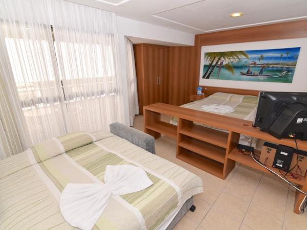 Mirador Praia Hotel : photo 2 de la chambre chambre triple deluxe