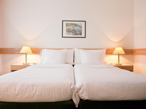 Drake Longchamp : photo 6 de la chambre chambre double ou lits jumeaux avec kitchenette