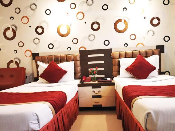 Hotel Executive Tower : photo 10 de la chambre chambre deluxe double ou lits jumeaux