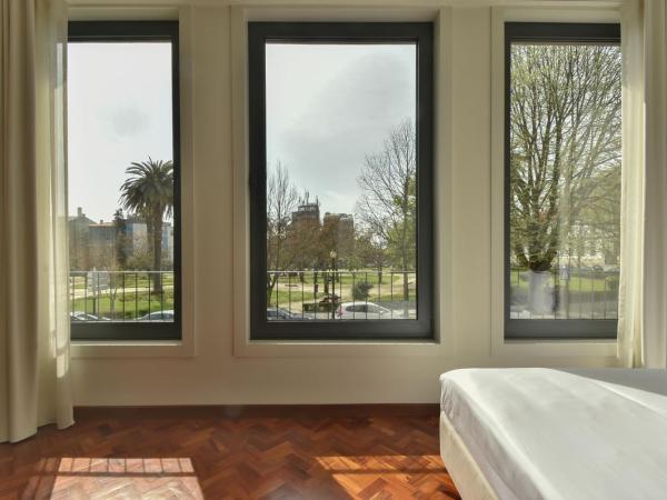 Republica 157 Guest House : photo 2 de la chambre chambre lit king-size - vue sur jardin