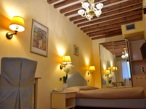 Residenza Favaro : photo 3 de la chambre chambre double ou lits jumeaux