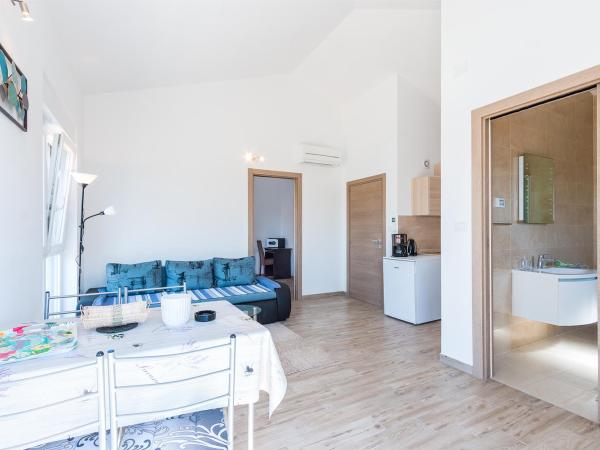 Guesthouse Bencun Medulin : photo 1 de la chambre appartement avec terrasse