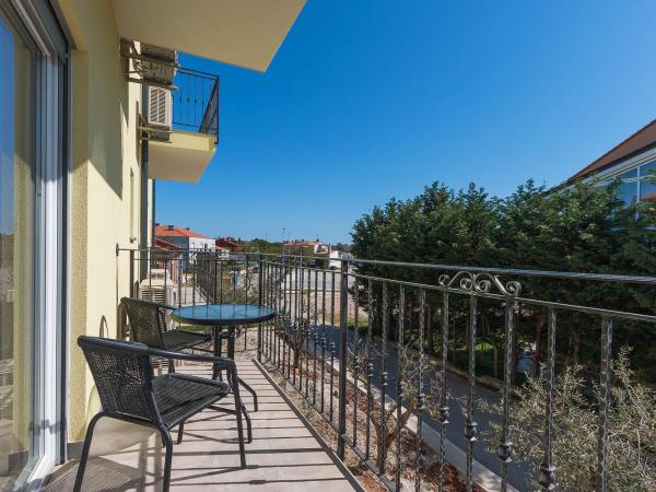 Guesthouse Bencun Medulin : photo 8 de la chambre appartement avec terrasse