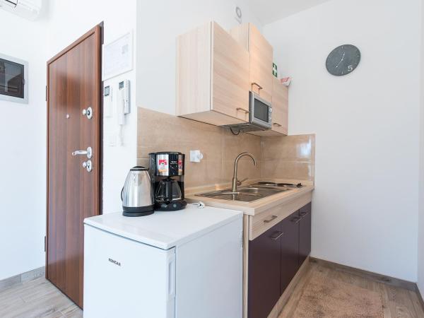 Guesthouse Bencun Medulin : photo 9 de la chambre appartement avec terrasse