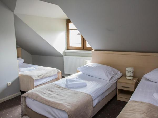 Dworek Jabłonna : photo 2 de la chambre chambre quadruple standard