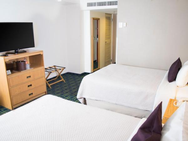 iStay Hotel Monterrey Histórico : photo 1 de la chambre chambre double supérieure avec deux lits doubles